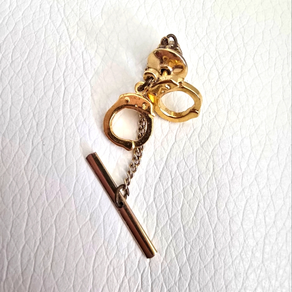 Gold Handcuff Charm Tie TAC
